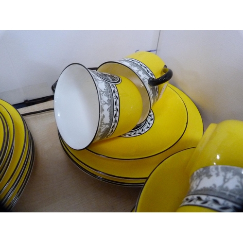 10 - Shelley part tea set decorated with a pictorial scene of female dancers on a yellow ground.  (39)