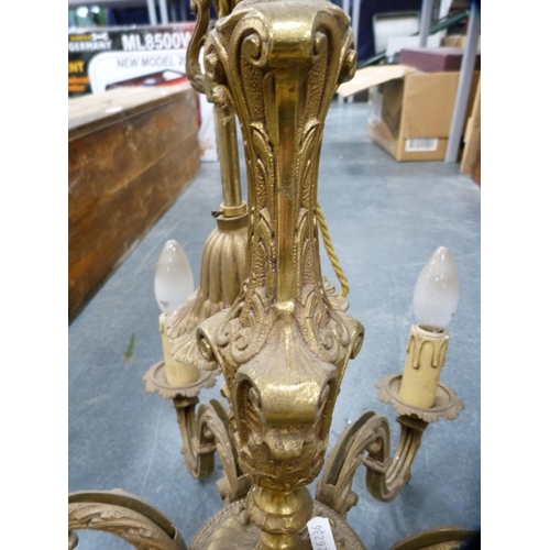 100 - Six-branch electrolier and a ceiling light in the form of a searchlight.  (2)