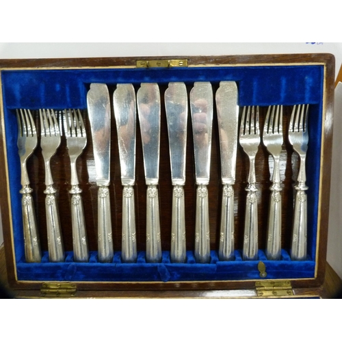 104 - Set of twelve fish knives and forks by Walker & Hall, cased.