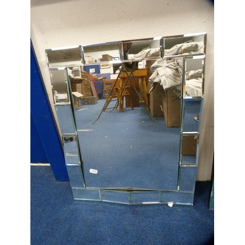 45 - Pair of unframed wall mirrors.