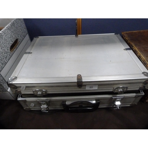 69 - Nikon Nikomat camera with flash and accessories, in fitted case.