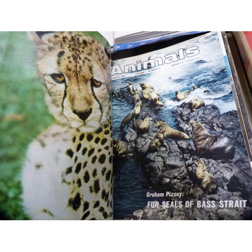 70 - Three boxes of Atlas model trains, boxed, and a collection of wildlife index fact files etc.