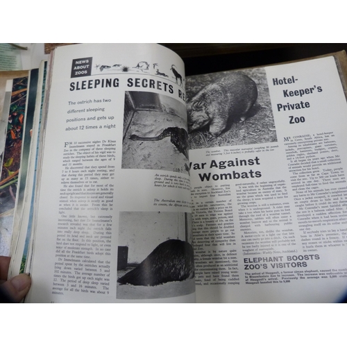 70 - Three boxes of Atlas model trains, boxed, and a collection of wildlife index fact files etc.