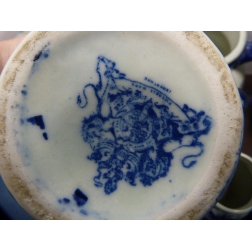 72 - Reproduction blue and white ceramic toilet ewer and basin, and a set of reproduction graduated jugs.