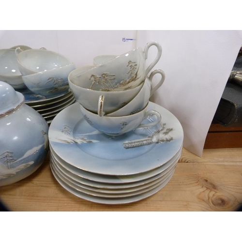 89A - Part eggshell tea set.