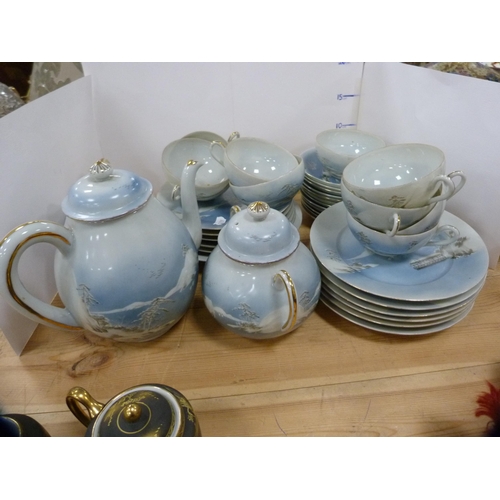 89A - Part eggshell tea set.