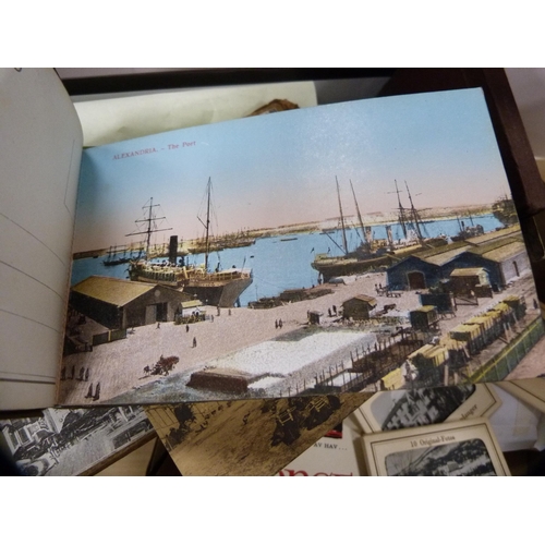 9 - Collection of interesting antique postcards and photographs contained in two shallow boxes to includ... 