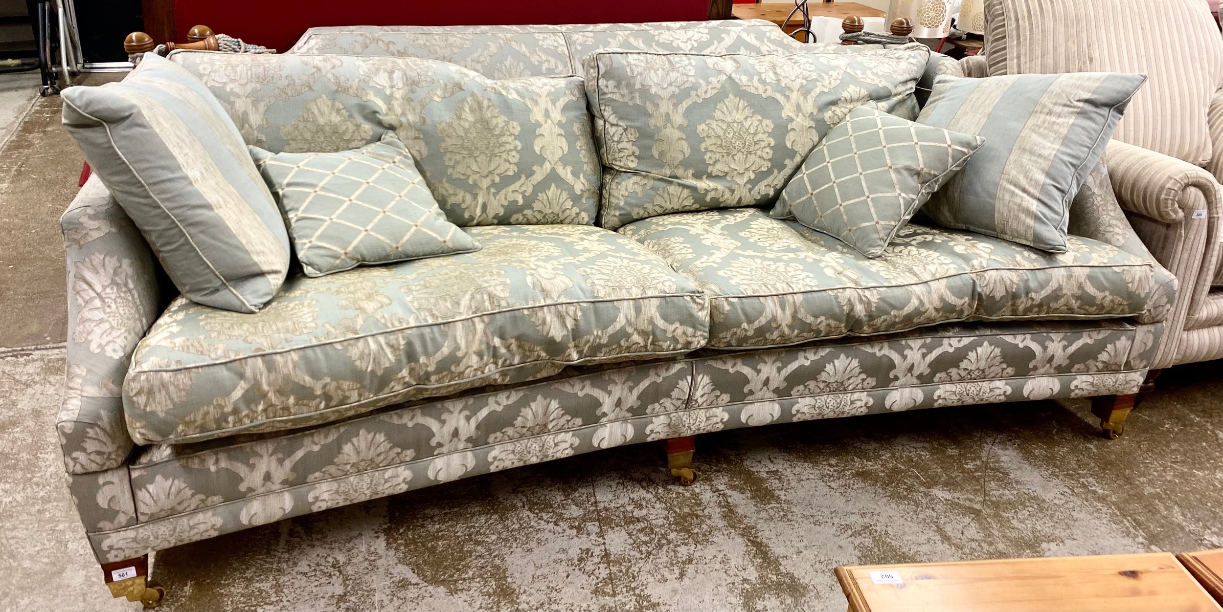 Large drop arm Duresta settee with four cushions, front legs on casters ...