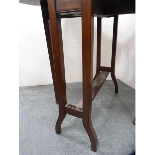 572 - Mahogany Sutherland table.