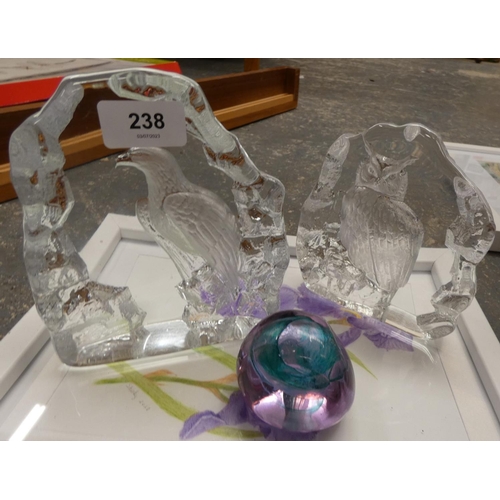 238 - Two large clear glass paperweights and another. (3).