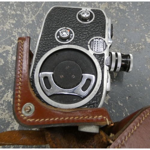 255 - Paillard Bolex cine camera and leather case.