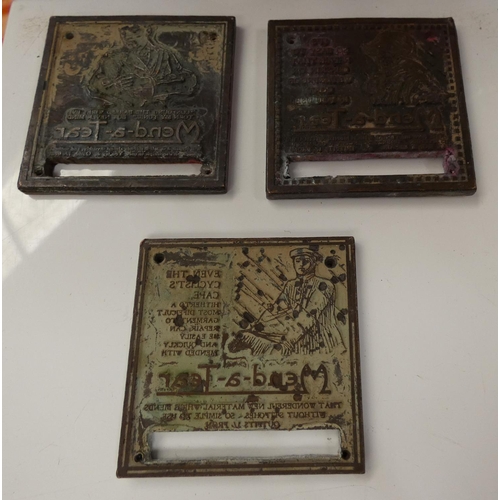 344 - Three small bronze printing plates.