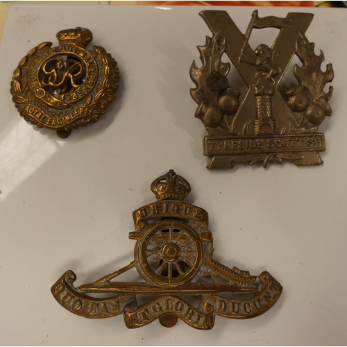 360 - Three army cap badges including Royal Engineers, Tyneside Scottish, etc. (3).