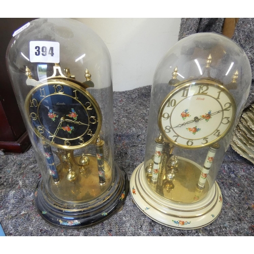 394 - Two large Kundo anniversary clocks.