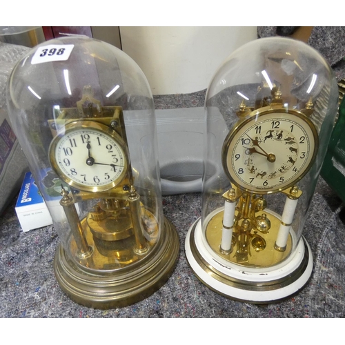 398 - Two large anniversary clocks.