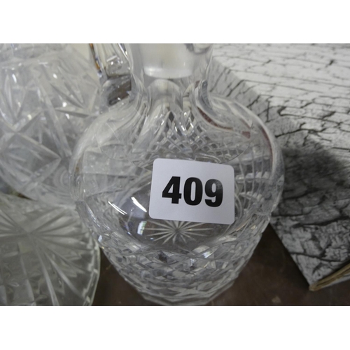 409 - Four cut glass decanters, carafe & ewer.