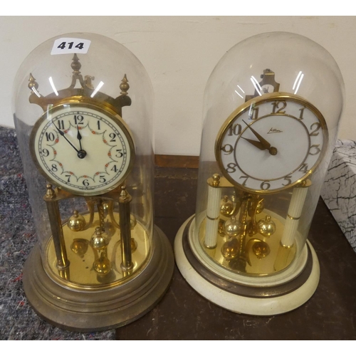 414 - Two large German anniversary clocks.