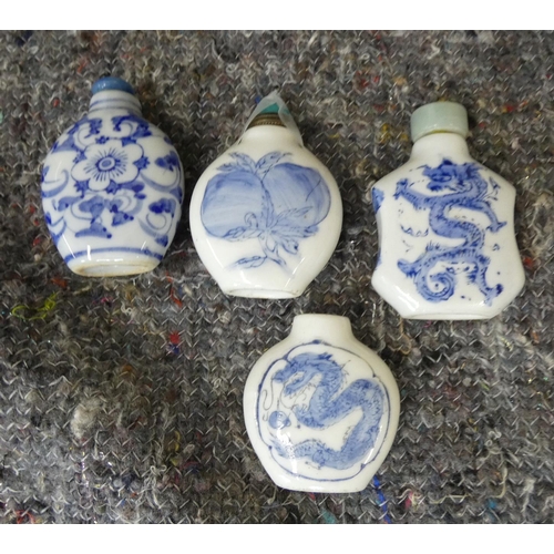 419 - Four modern blue and white Chinese snuff bottles.