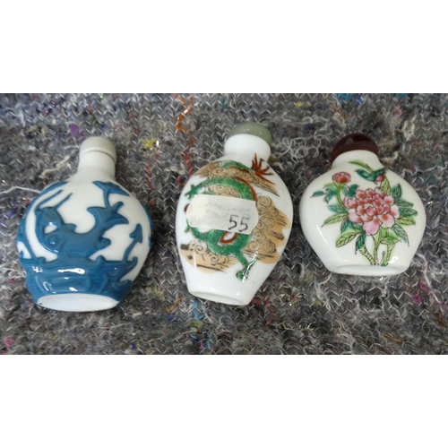 420 - Three modern Chinese snuff bottles, various patterns.