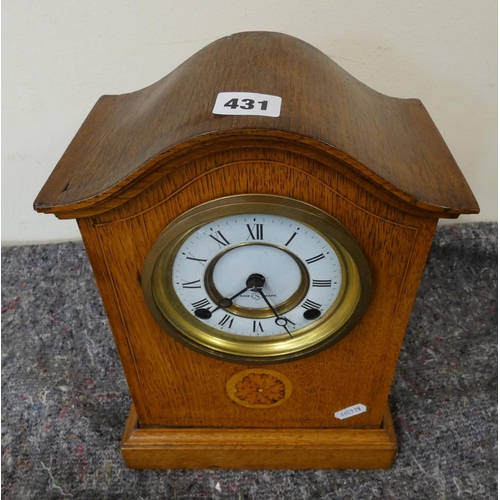 431 - Antique oak mantel clock.