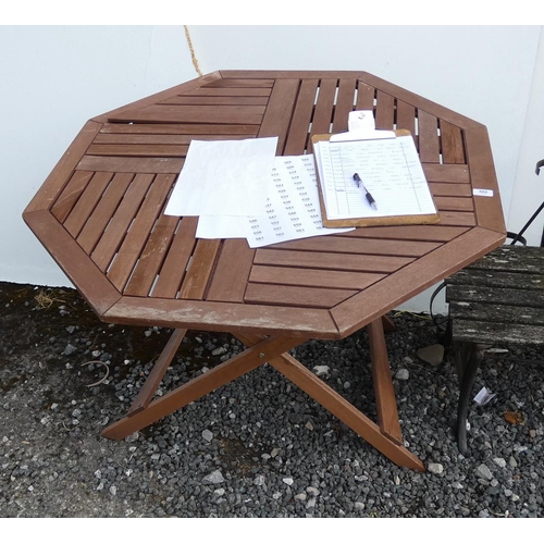 502 - Teak garden table, four chairs, parasol and two cushions.