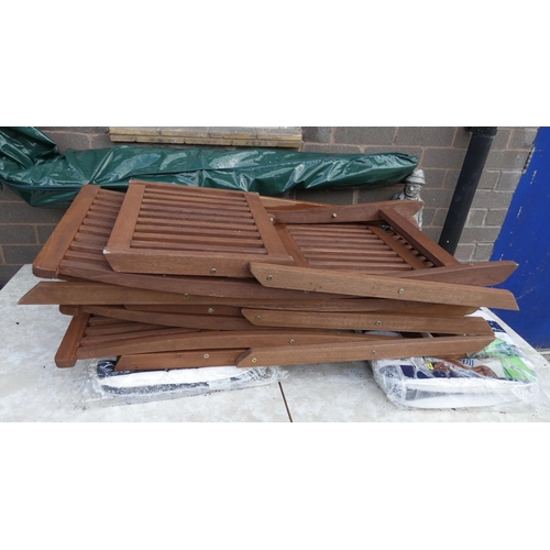 502 - Teak garden table, four chairs, parasol and two cushions.