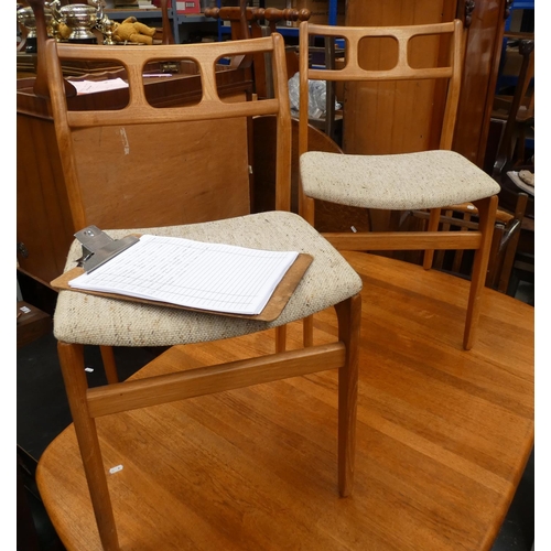 516 - Mid 20th century D Scan table and four chairs.