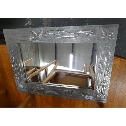 523 - Arts and Crafts style hammered frame mirror. 54cm x 38cm