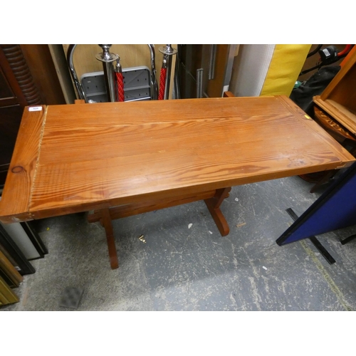 528 - Pine side table on trestle base, 81 x 108cm, and a mid-century coffee table.  (2)