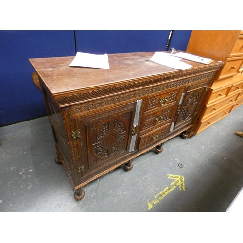 550 - Carved oak sideboard.