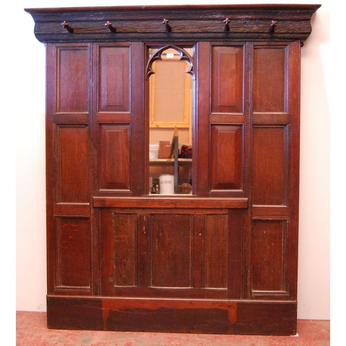 376 - English Arts & Crafts oak hallstand, with naturalistic cornice and five ornate pegs above a Goth... 