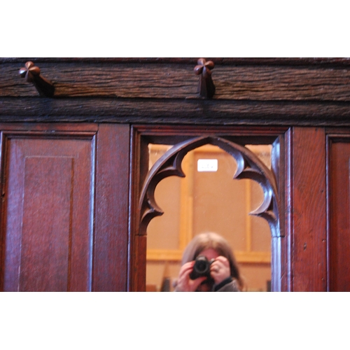 376 - English Arts & Crafts oak hallstand, with naturalistic cornice and five ornate pegs above a Goth... 