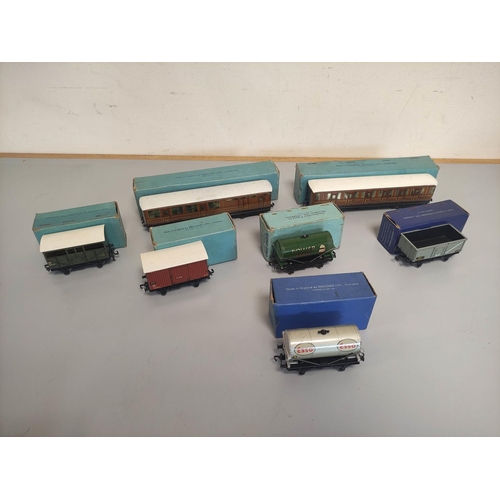 373 - Collection of boxed OO gauge Hornby Dublo rolling stock to include two Corridor D1 Coaches, an Esso ... 