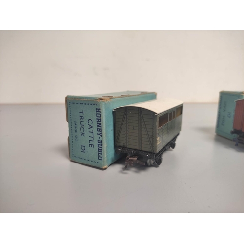 373 - Collection of boxed OO gauge Hornby Dublo rolling stock to include two Corridor D1 Coaches, an Esso ... 