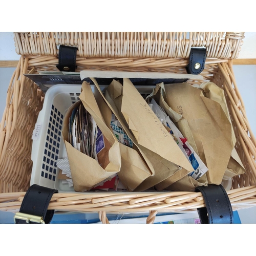 384A - Basket containing a large collection of 20th century British postage stamps. 