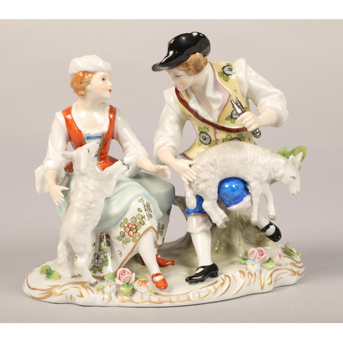 11 - Sitzendorf couple with lambs, another German figure woman with lamb, and Royal Doulton boy reading T... 