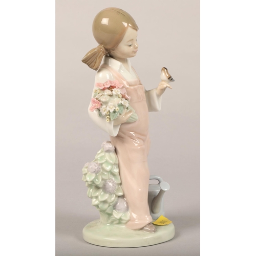 25 - Lladro girl with bird and two Nao figures boy with football, and ducks (3)