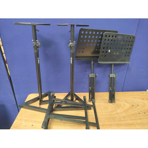 322B - Two folding music stands, a keyboard stand and two Adam Hall monitor stands.