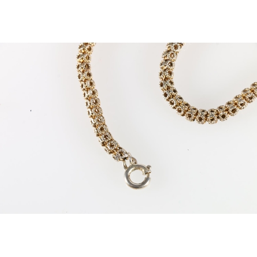 457 - Silver neck chain formed of rope twist ring shaped links, the clasp stamped '925', 88cm long, 67g.