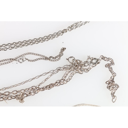 458 - Contemporary cast white metal bracelet in the manner of Tiffany, and a silver neck chain and three o... 