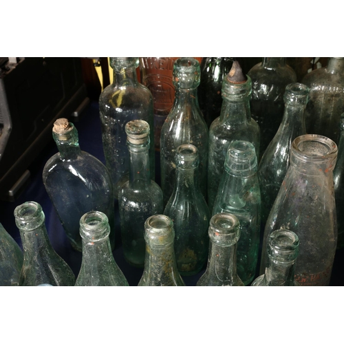 12 - Vintage glass bottles to include a torpedo shaped bottle for Schweppes, Aitken of Dunbar, Hendry's L... 