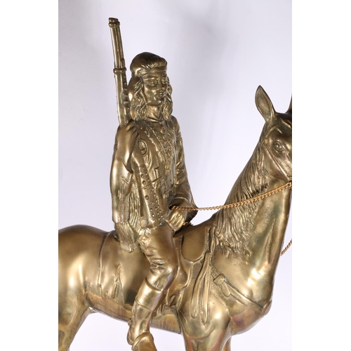 24 - Large brass Native American Indian on horseback model, 71cm high.