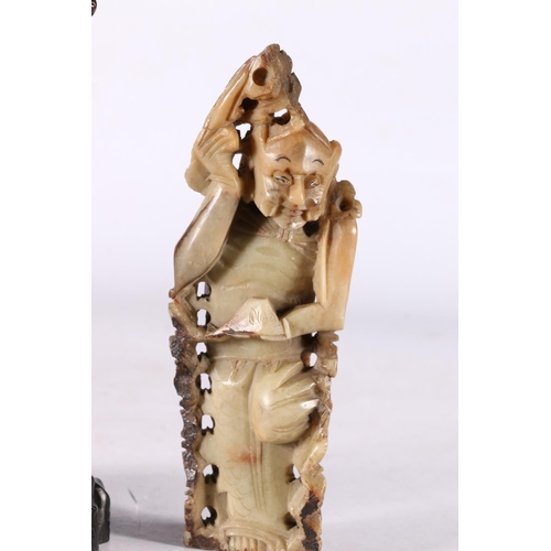 246 - Chinese soapstone carving of a male figure, 16cm high, and a Chinese wood carved figure group, 20cm ... 