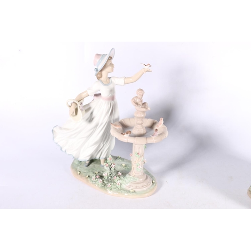 262 - Lladro A Reading Lesson, #6766, 31cm high, and Spring Joy. #6106, 27cm high.  (a/f)