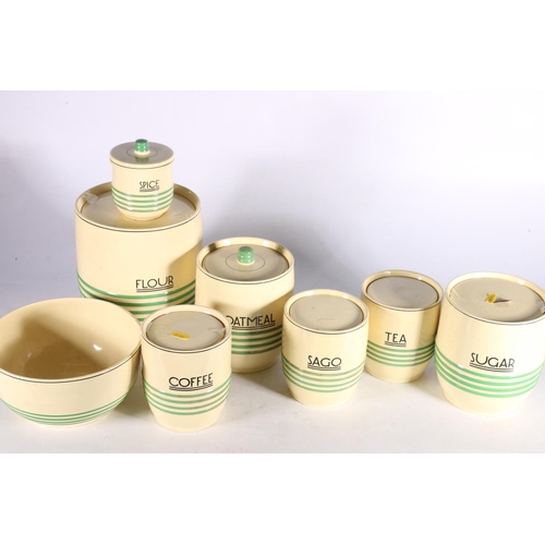 35 - Minton Green Stripe kitchenware to include crocks for flour, oatmeal, sugar, spice, coffee and tea, ... 