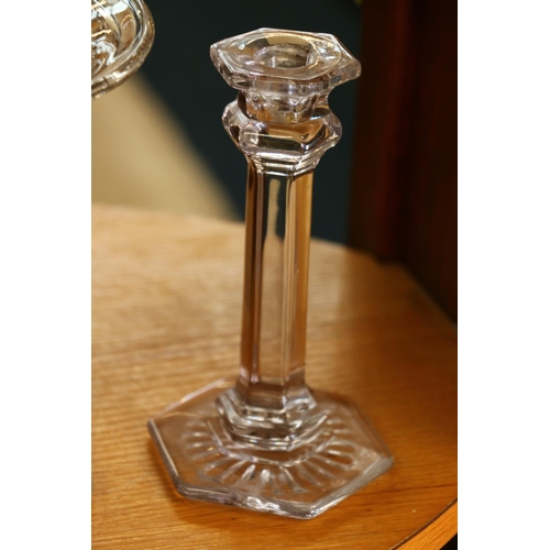 36 - Moulded glass trumpet shaped flower vase, and a pair of candlesticks.