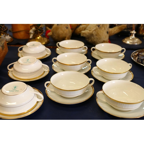 40 - Nine Crown Staffordshire Golden Glory two-handled soup coupes and saucers.