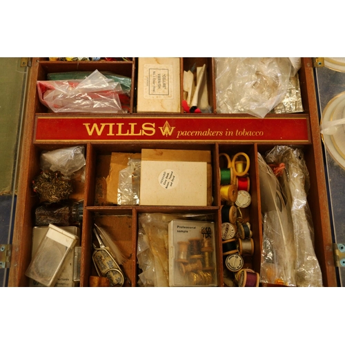 41 - Old Wills tobacco box containing fishing accessories to include flies, etc.