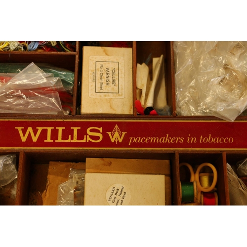 41 - Old Wills tobacco box containing fishing accessories to include flies, etc.