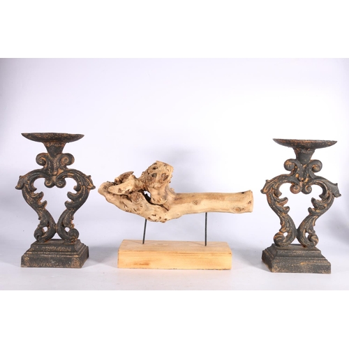 53 - Pair of metal scroll work candle stands, and a driftwood sculpture.